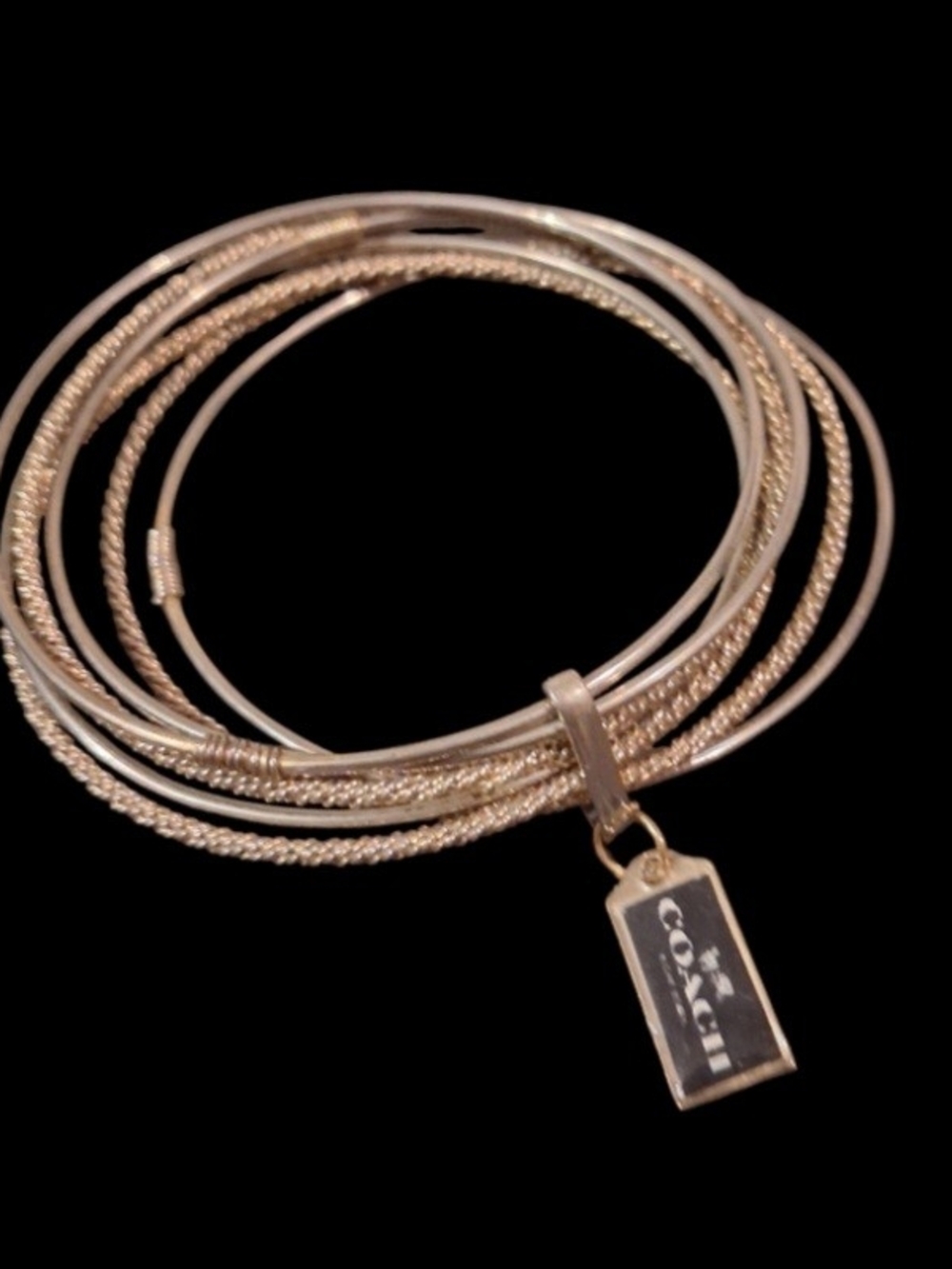 Coach Gold-Tone Multi-Bangle Bracelet with Logo Tag